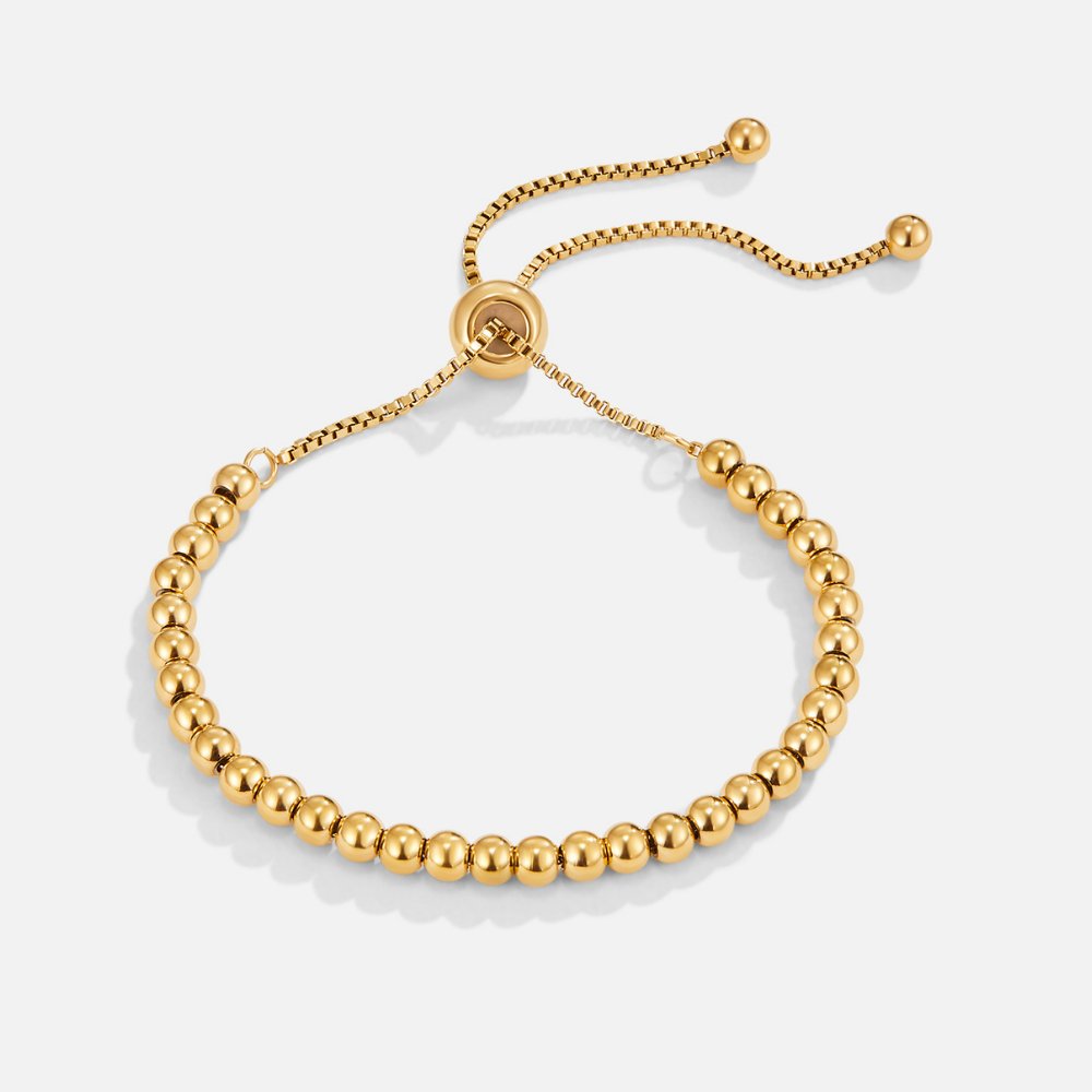 Pulsera Niloya con cuentas en oro